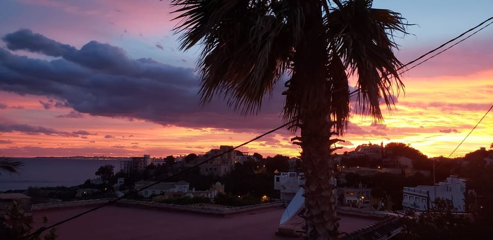 Sunset from the the living room - kitchen and deck 
