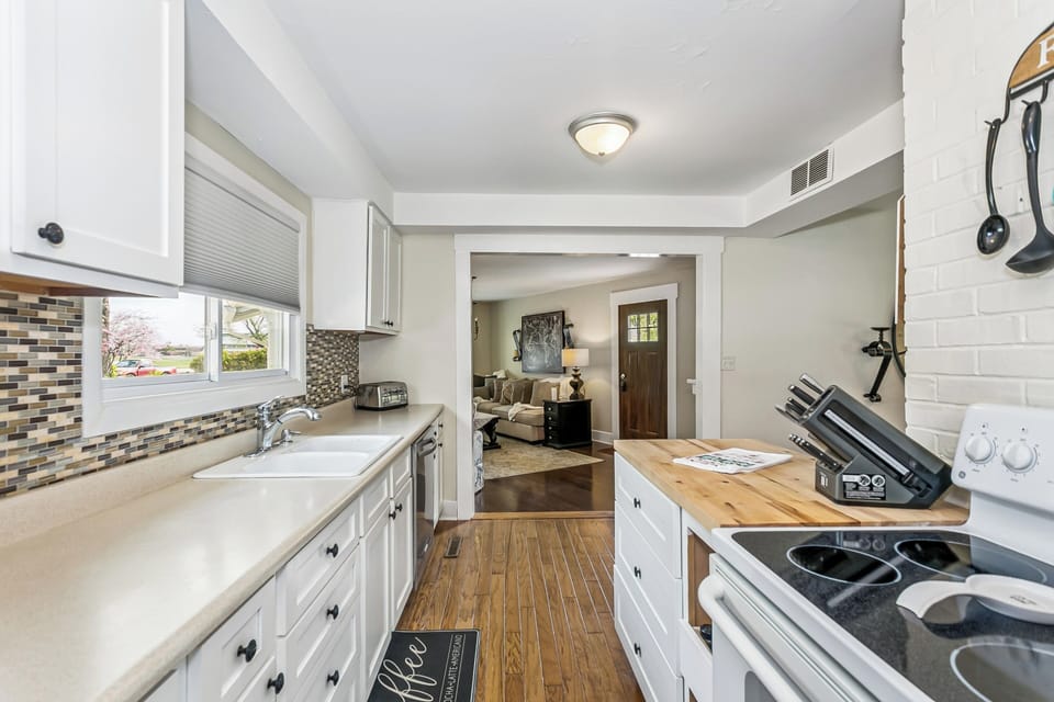 Wall oven, stove, pantry, over/under refrigerator, butcher block counter +'s