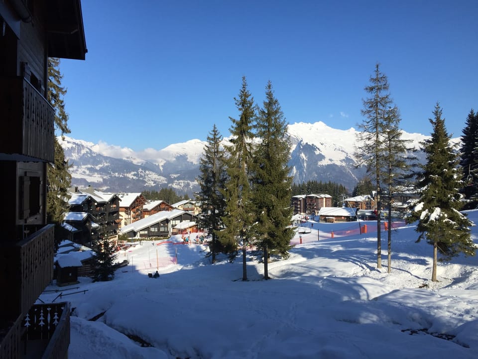 View from apartment balcony down to the nearest chairlift.