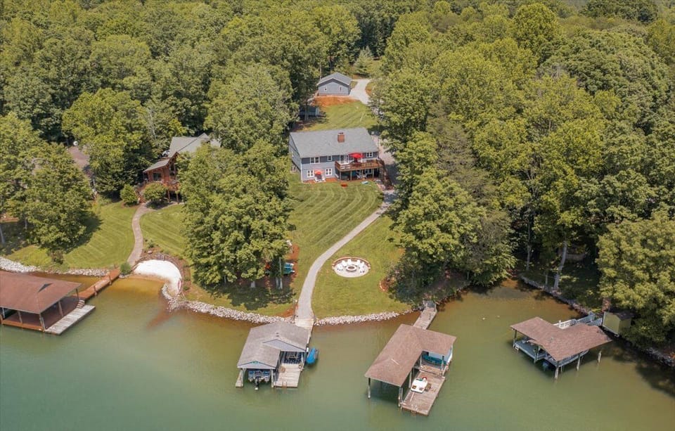 Aeriel view of large home and yard.