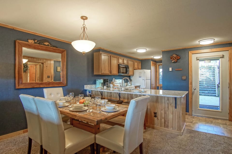 Dining area for six and seating for three at the kitchen counter/island