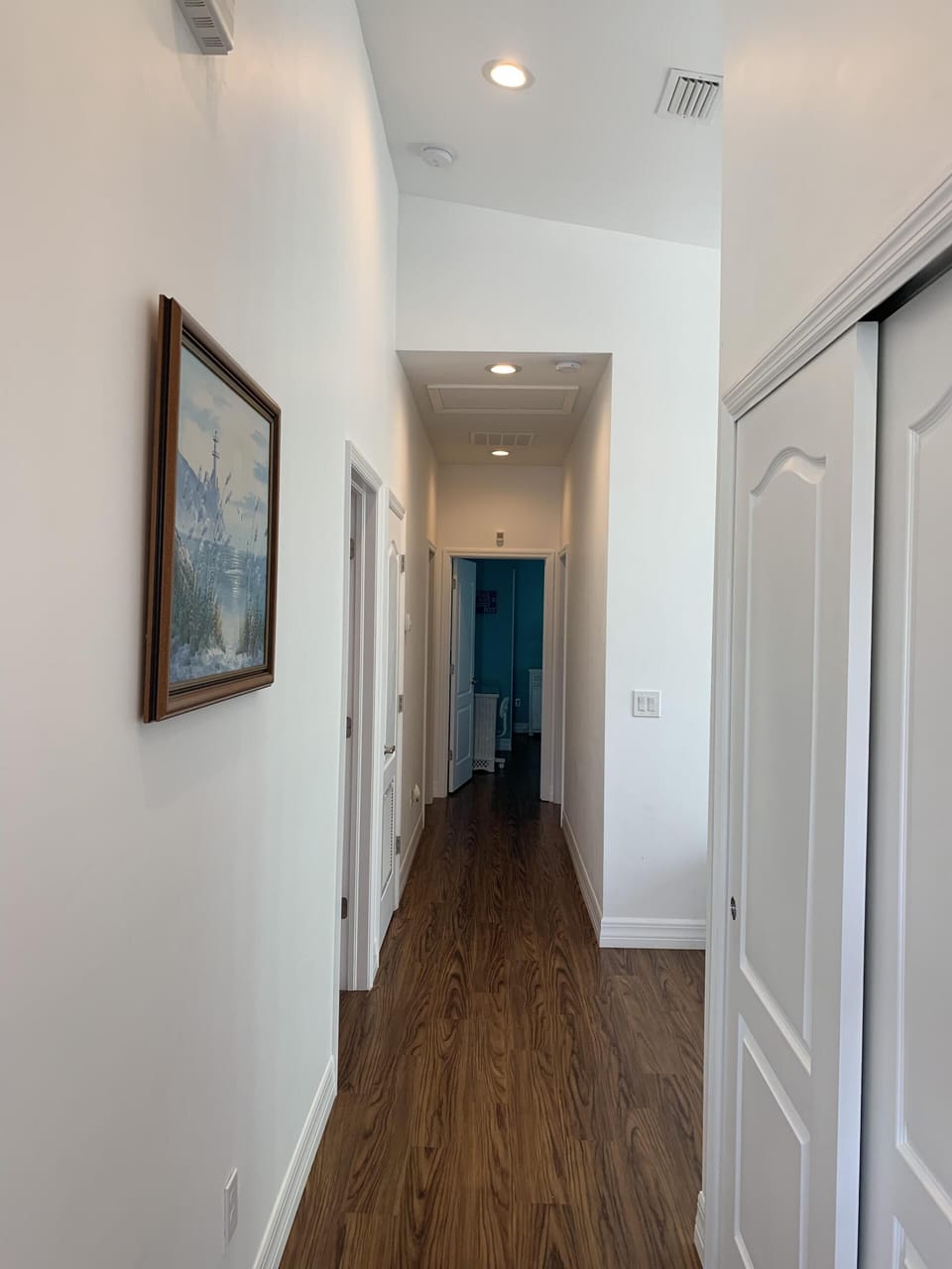Hallway off Foyer leading to all bedrooms