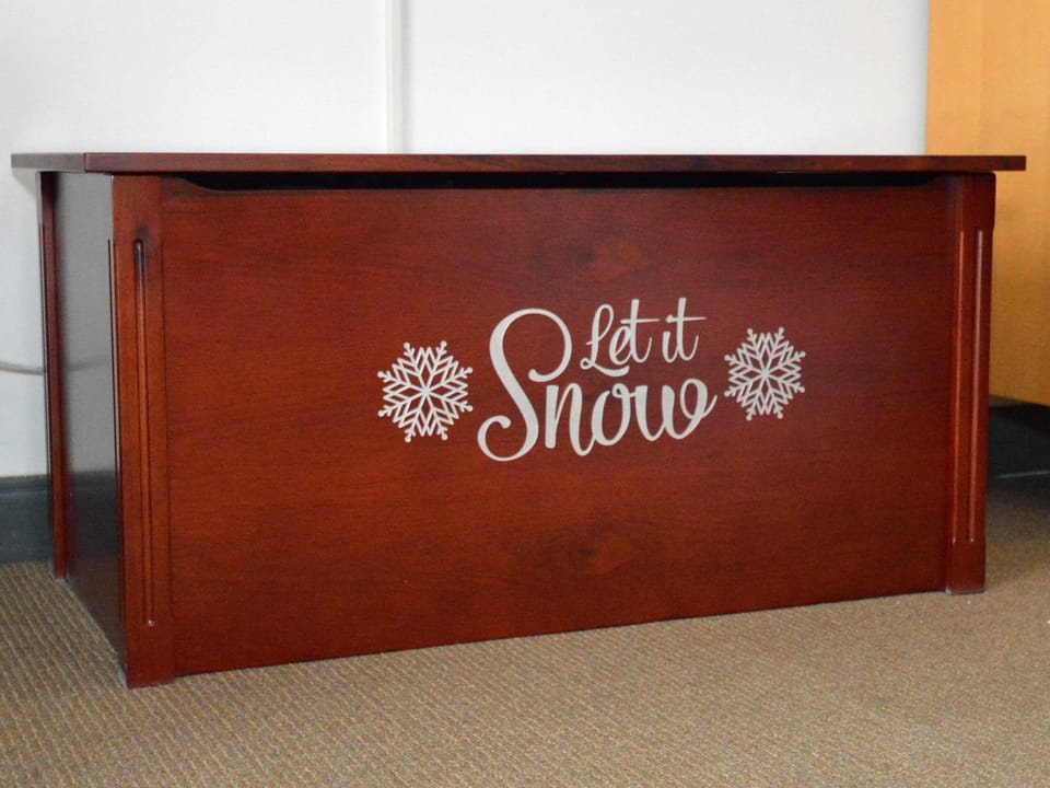 You'll find clean sheets and pillows to make up the sofabed in the "Let it Snow" chest.