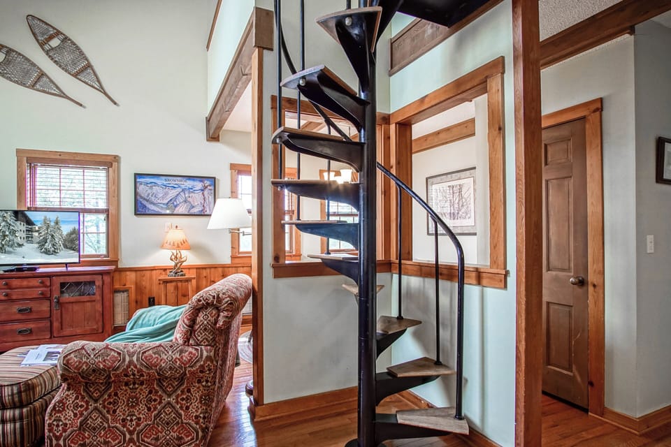 These spiral stairs lead up to the top level.