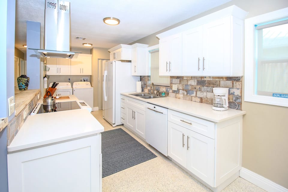 Large brand new kitchen cabinets, appliances and more.