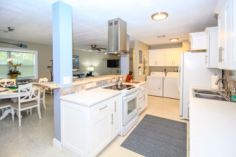 Contemporary kitchen with every amenity.