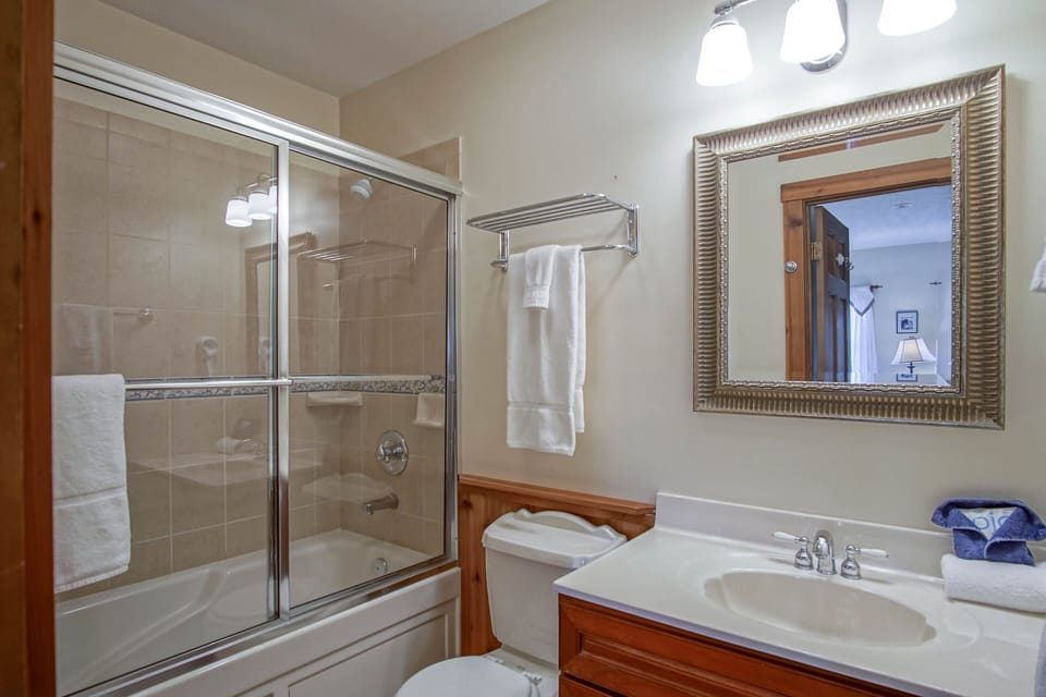 This is the master bathroom. It has a shower/tub combo.