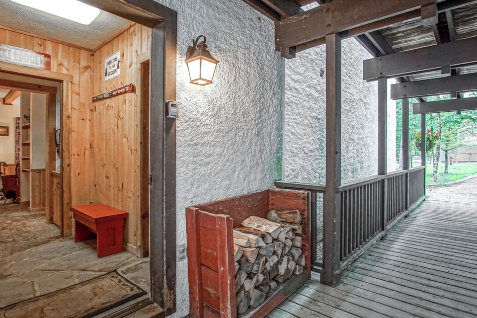 The wood for the fireplace is located outside the main entrance.