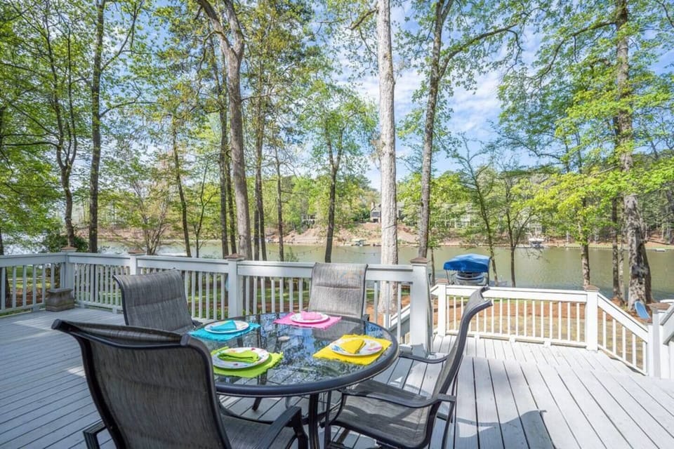 Lakefront outdoor dining space on deck