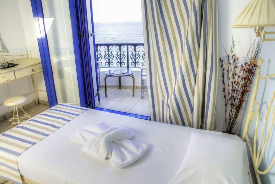 Double or Twin Room, Sea View | Soundproofing, iron/ironing board, free WiFi, bed sheets