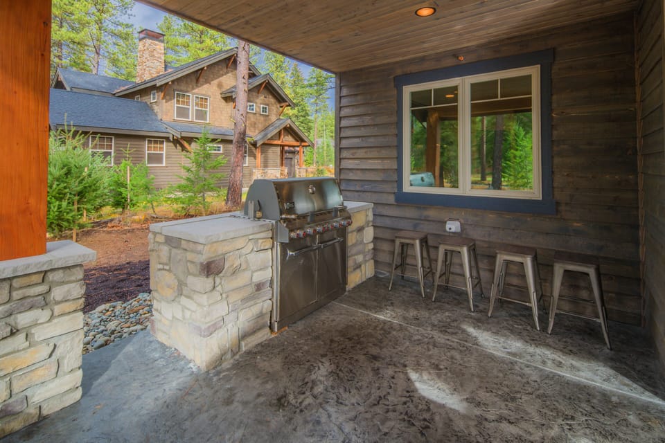 Heart of the Hill in Suncadia Resort - Outdoor BBQ Area with 4 bar stools.