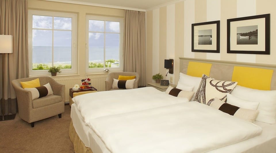 Hypo-allergenic bedding, free minibar, in-room safe