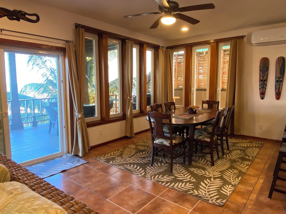 Indoor dining for six plus four barstools.