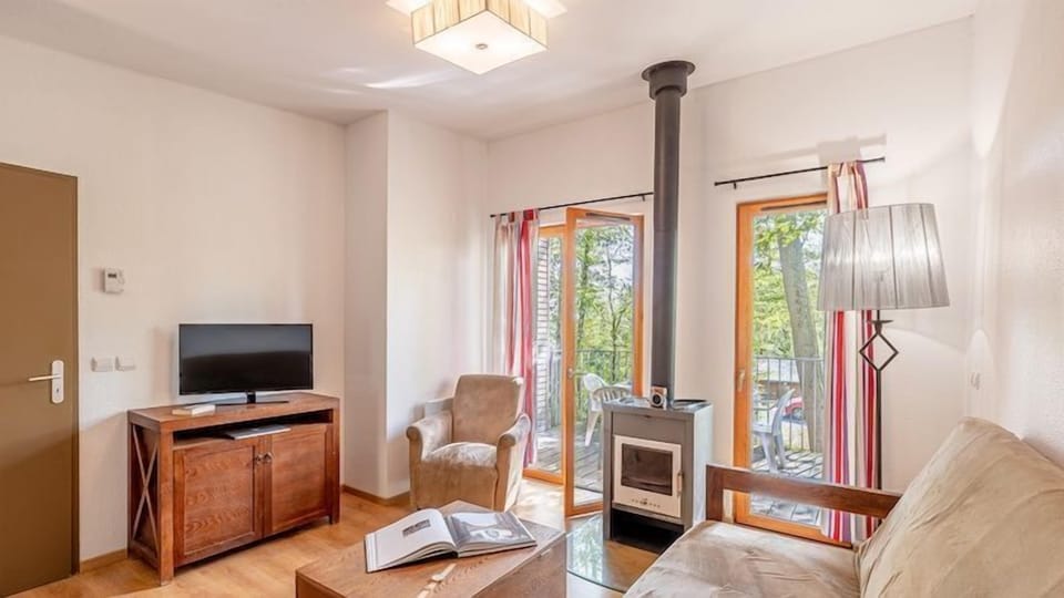 The living area is bright and cozy, perfect for relaxing after a wonderful day.