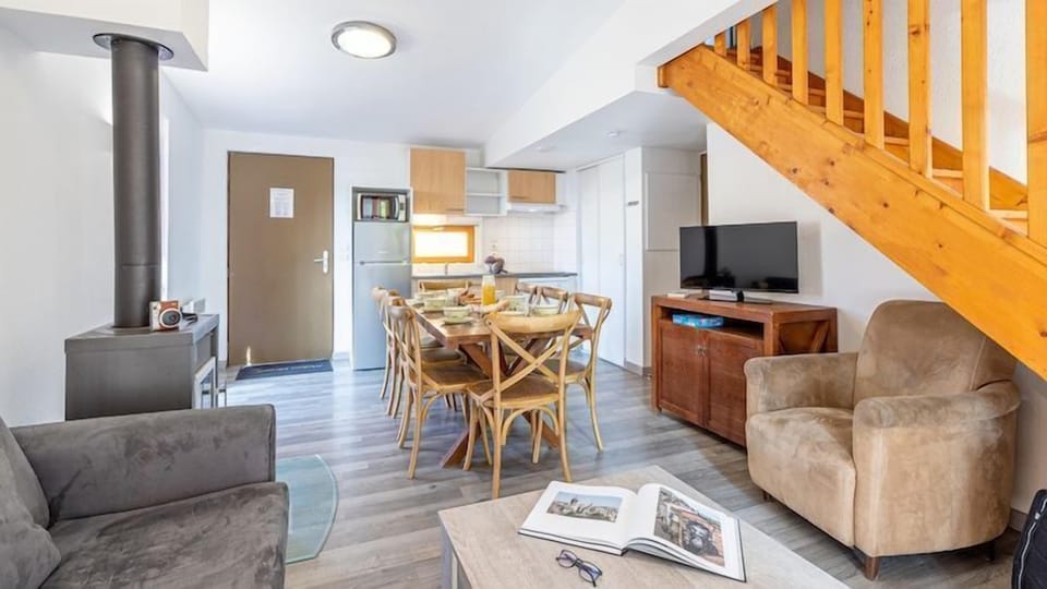 The living area is bright and cozy, perfect for relaxing after a wonderful day.