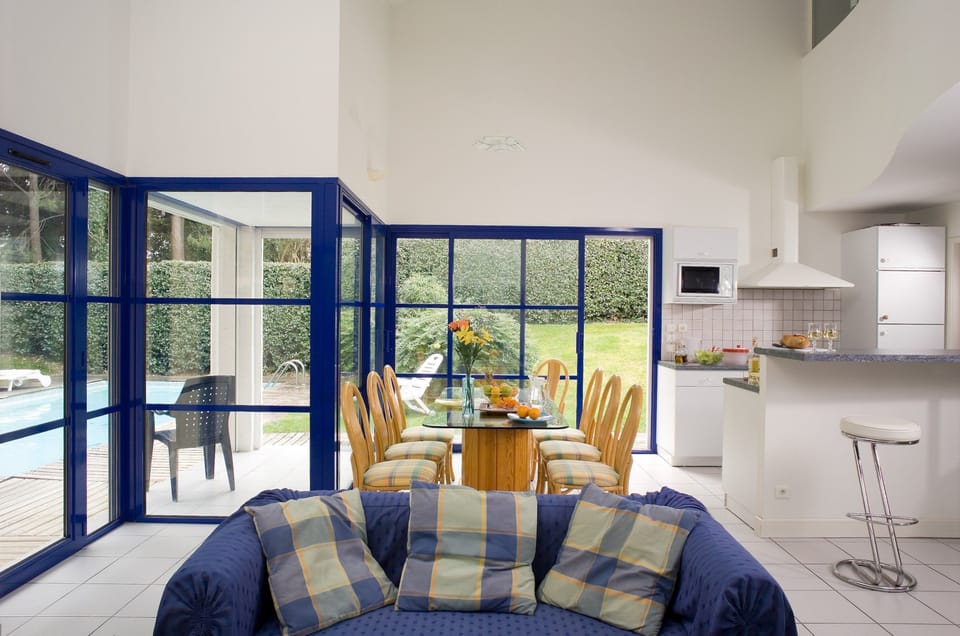 Find peace and relaxation with your close friends and family in this stunning living room featuring bright decor.