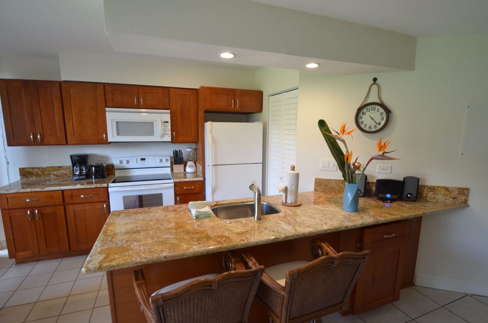 Kitchen, new stove & microwave, granite counter, cherry wood