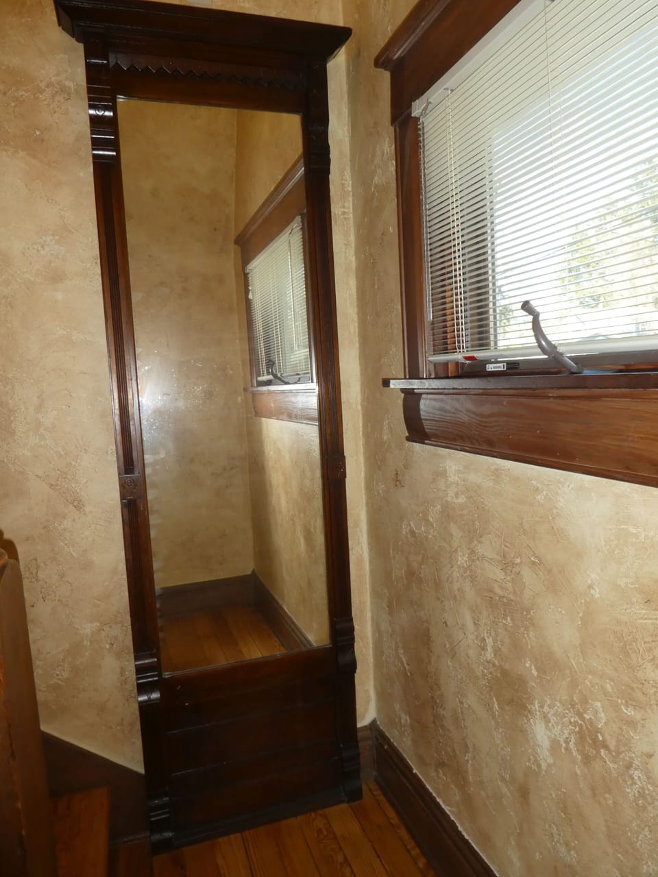 mirror at landing on stairs