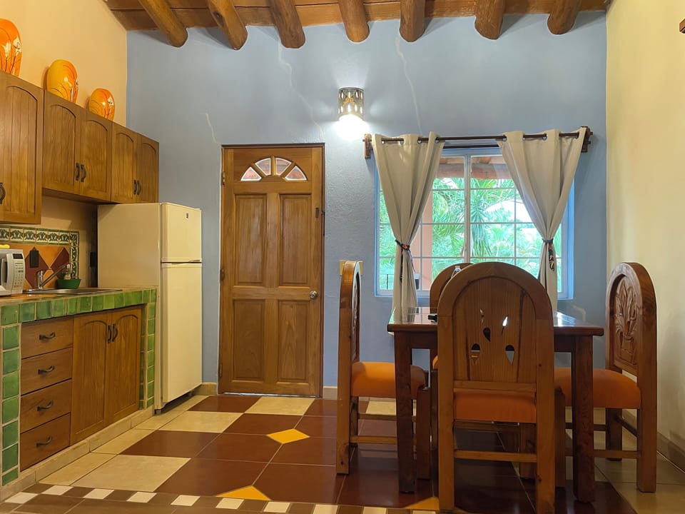 Premium Room, Multiple Beds, Non Smoking | Private kitchen | Fridge, microwave, cookware/dishes/utensils