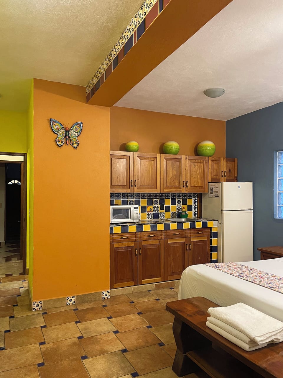 Deluxe Triple Room, Multiple Beds | Private kitchen | Fridge, microwave, cookware/dishes/utensils