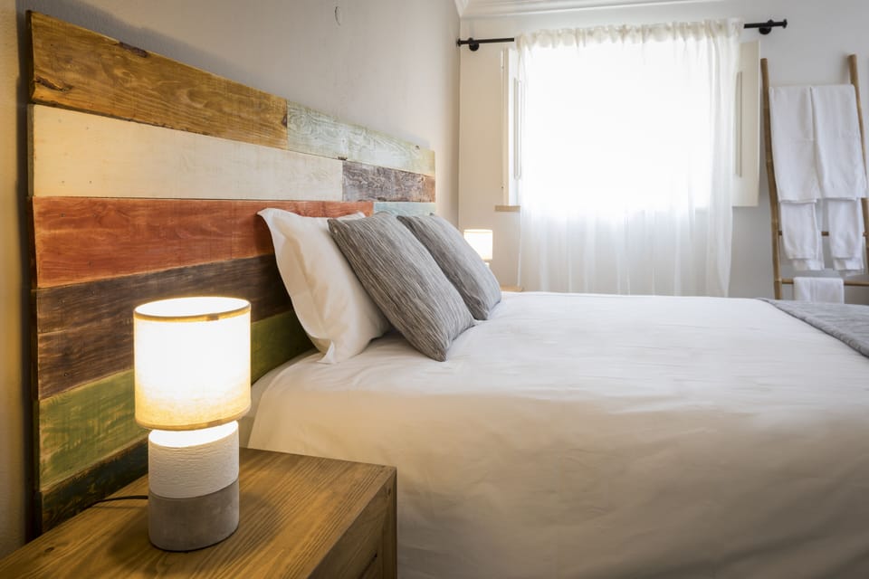 Family Room | Premium bedding, down comforters, blackout drapes, WiFi (free)