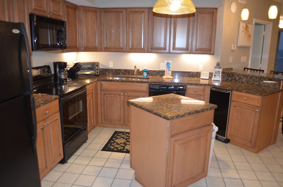 Spacious, well stocked kitchen.