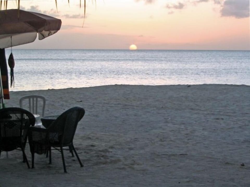 Enjoy Sundowners on the beach at Castaways