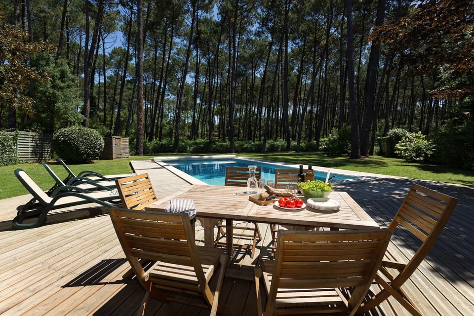 Enjoy reminiscing about your day while sipping a glass of wine by your private pool.