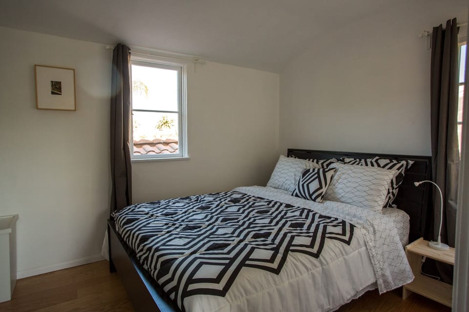 A queen bed in the bedroom.