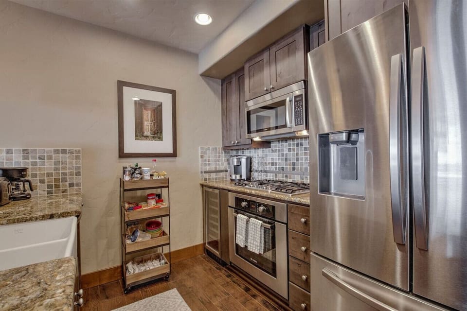 Keurig coffee maker and basic kitchen spices.