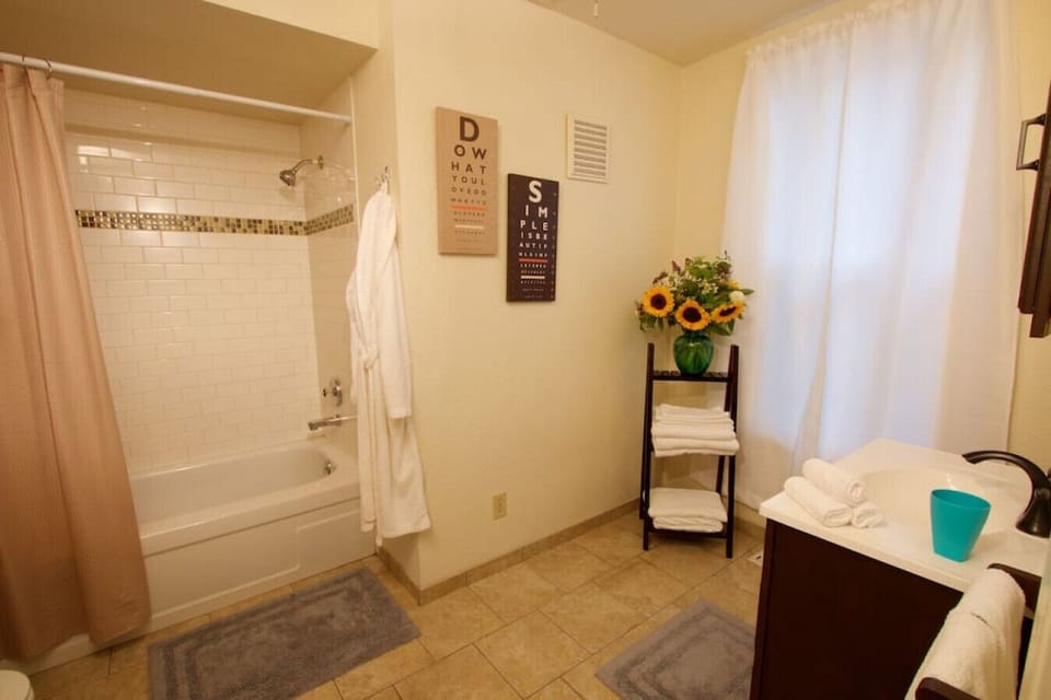 Shared bathroom with shower/tub