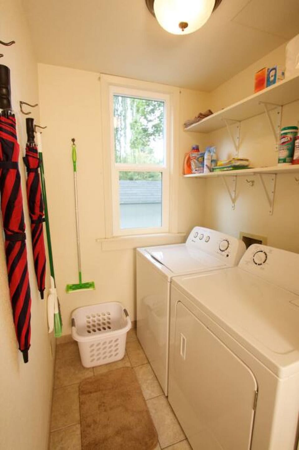 Full laundry room with washer and dryer