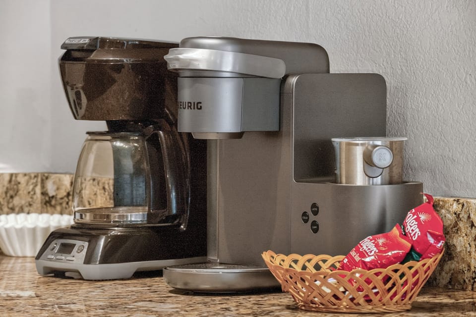 Brew your morning cup just the way you like it with this convenient coffee station—complete with a Keurig and classic drip maker for easy starts to your day.
