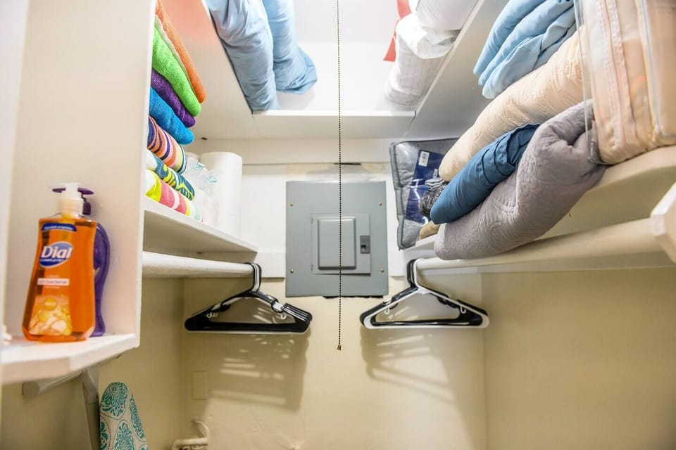The closet is well stocked with spare towels, blankets and sheets.  