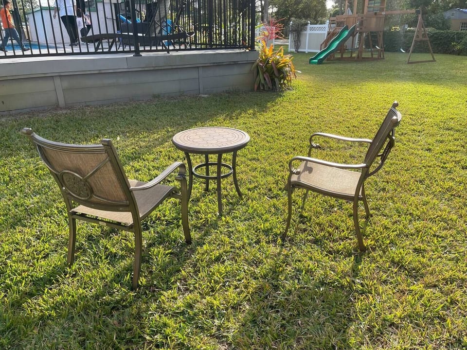 The backyard is fully fenced and is shared by eight units.  Parents can relax while their kids roam around freely.  The pool is fenced and has a child-resistant gate.