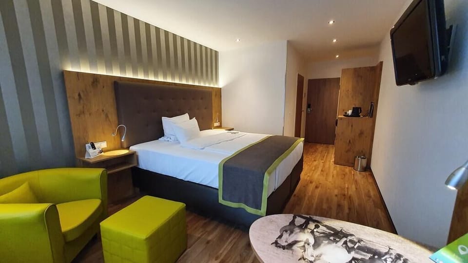 Hypo-allergenic bedding, in-room safe, laptop workspace, soundproofing
