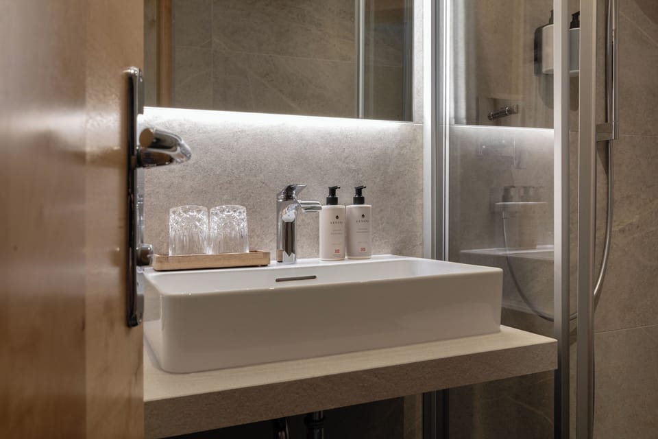 Family Room, Balcony | Bathroom | Combined shower/tub, free toiletries, hair dryer, bathrobes