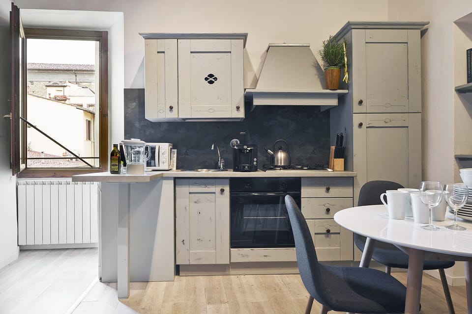 Apartment, 2 Bedrooms | Private kitchen | Full-size fridge, stovetop, highchair, cookware/dishes/utensils