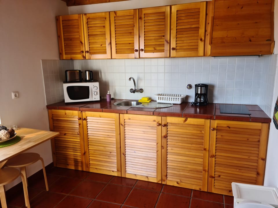 Romantic House, 1 Bedroom | Private kitchen | Shared fridge, microwave, stovetop, toaster