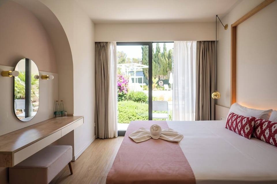 Exclusive Double Room, Garden View, Poolside | 20 bedrooms, in-room safe, desk, laptop workspace