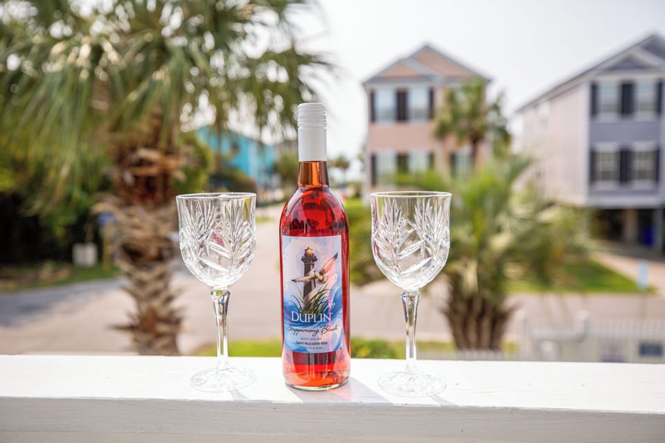 Sip in style at our beach house with ocean views!