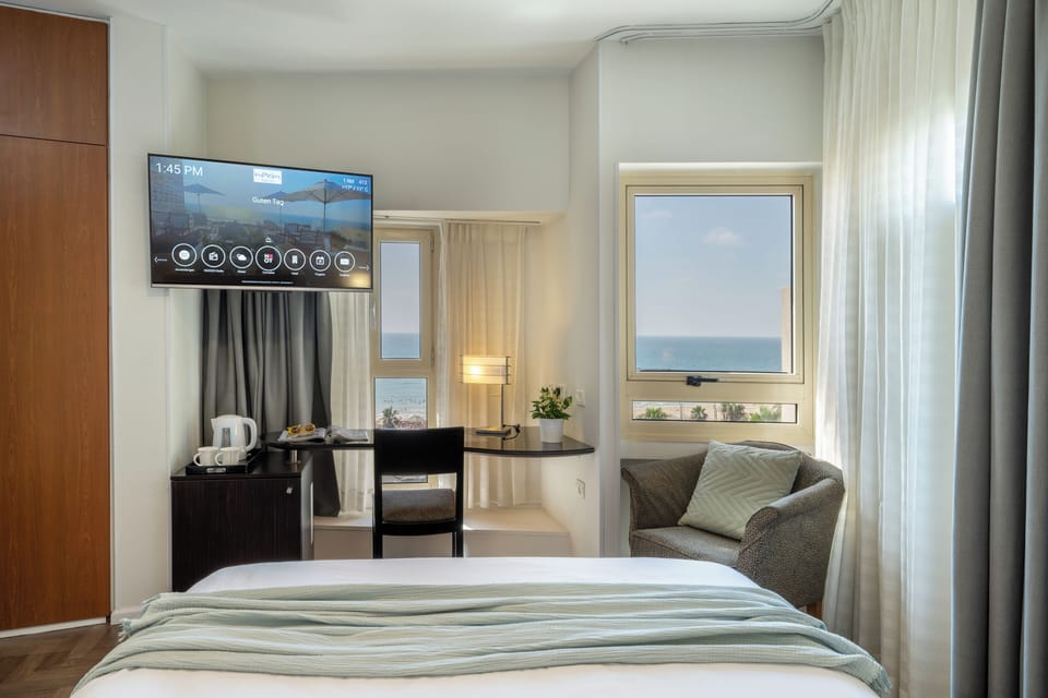 Standard Room, Sea View | In-room safe, desk, free WiFi, bed sheets
