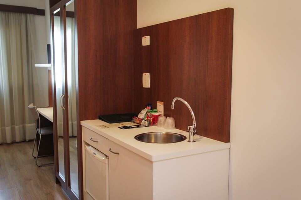 Executivo Casal | Minibar, in-room safe, desk, WiFi (free)