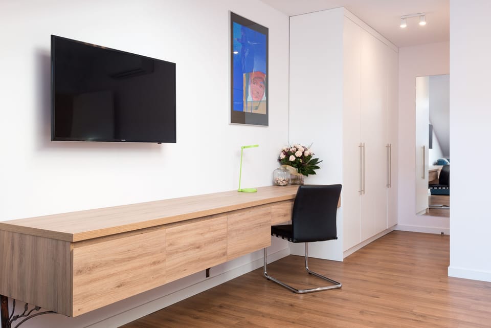with large wardrobes,  plus practical modern desk