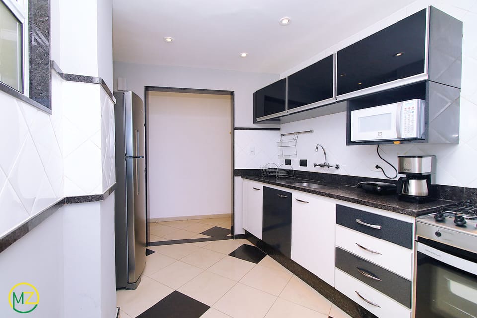 Penthouse, Multiple Beds, Non Smoking | Private kitchen | Full-size fridge, microwave, oven, stovetop