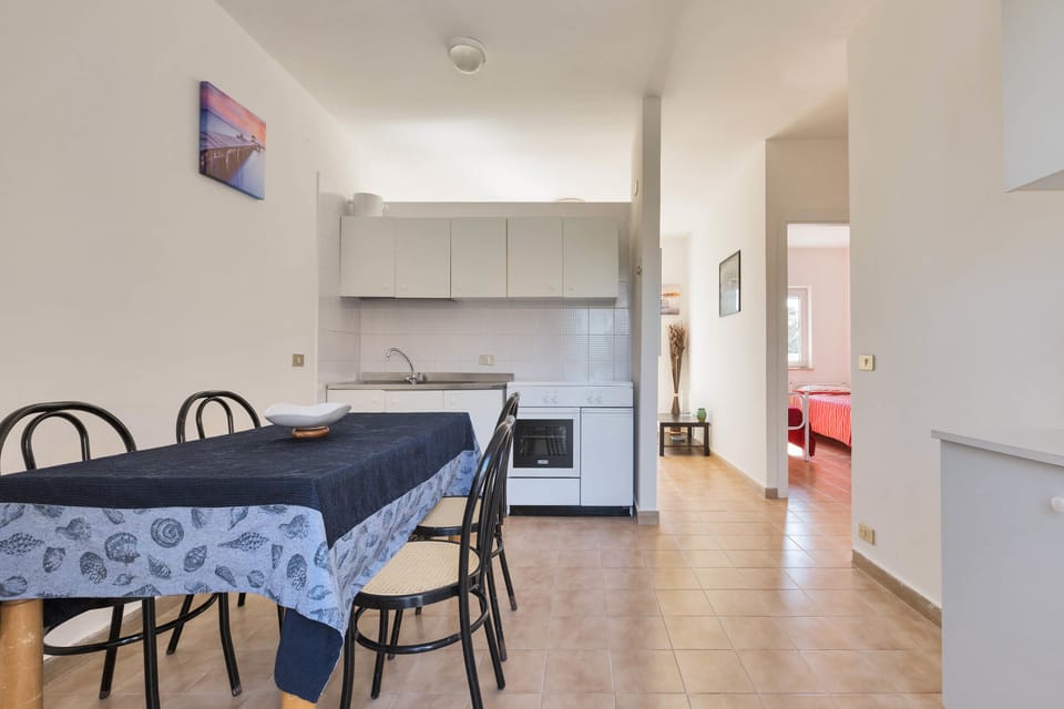 Standard Apartment, 2 Bedrooms | Private kitchen | Full-size fridge, stovetop, cookware/dishes/utensils