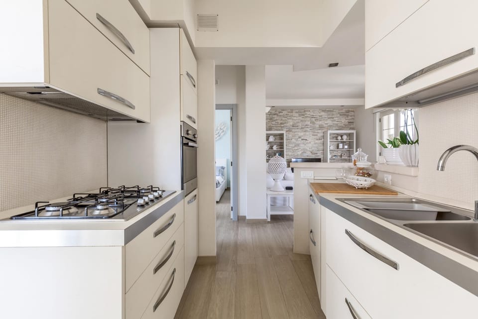 Comfort Apartment, 2 Bedrooms | Private kitchen | Full-size fridge, microwave, oven, stovetop
