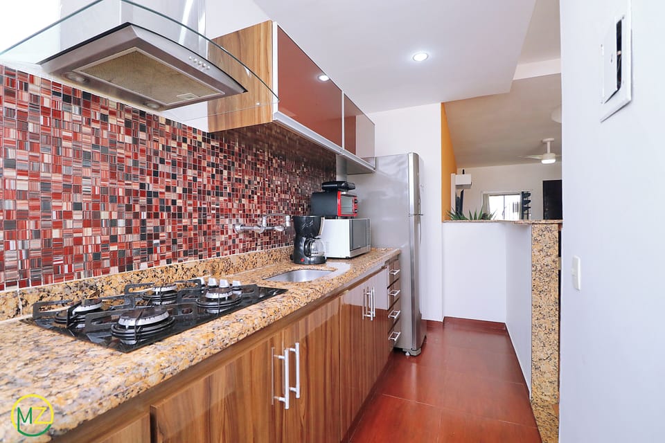 Comfort Penthouse, Multiple Beds, Non Smoking | Private kitchen | Full-size fridge, microwave, cookware/dishes/utensils