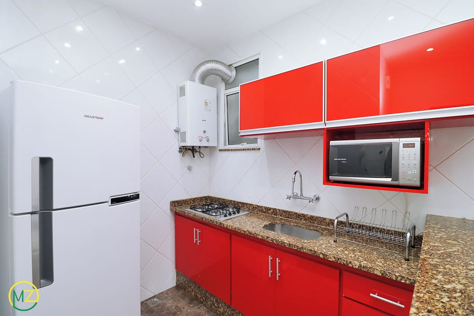 Apartment | Private kitchen | Full-size fridge, microwave, stovetop, cookware/dishes/utensils