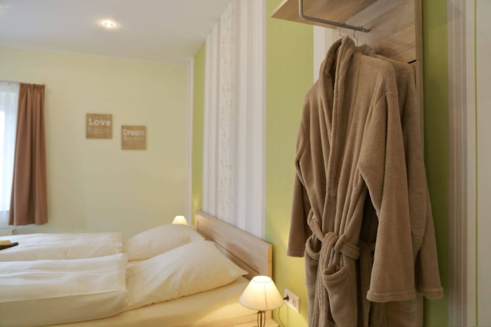 Double Room (Outside Toilet) | 2 bedrooms, WiFi (free), bed sheets